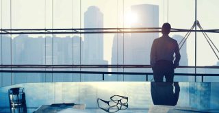 Businessman in a big office