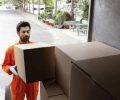 freepik_delivery-man-loading-car-with-delivery-boxes