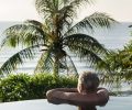 Senior man chilling in swimming pool