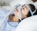 freepik_woman-wearing-anti-snoring-chin-straps