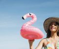 happy-girl-with-inflatable-flamingo